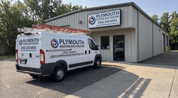 Plymouth Heating And Cooling facility exterior with company van